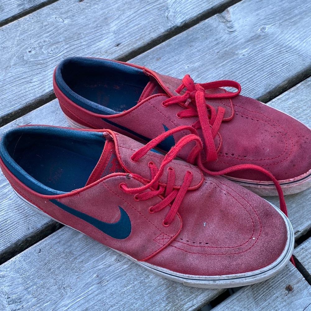 Faded red and navy nikes